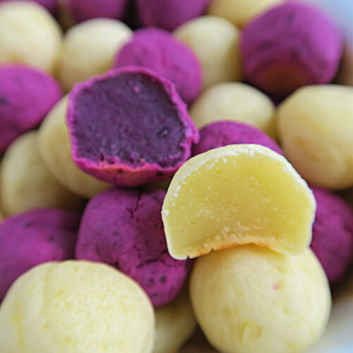 Bowl full of purple and white sweet potato mochi balls