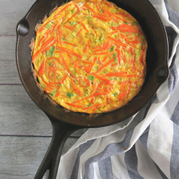 carrot frittata in a cast iron skillet.