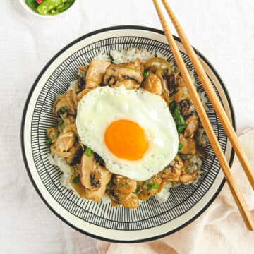 chicken and mushroom stir fry rice bow with fried egg.l.